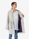 Candid shot of Silver Scale Longline Hooded Jacket in Silver - Profound Aesthetic showcasing purple inner lining