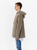 Side view image of Pigment Dyed Washed Hoodie in Faded Khaki on model