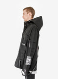 Left view of Cargo Belt Graphic Jacket in Black on model