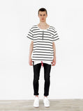 Head to toe shot of Neutral Stripe Half Sleeve Pullover Shirt in Black/Off-White paired with black denim