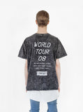 Back view of Someday Happy/Sad Distressed Acid Washed Tour Tee in Black Mineral Wash on model