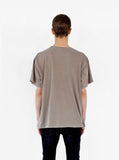 Back view of Pigment Dyed Basic Tee in Sandstone on model