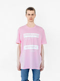 Front image of Internal/External Logo Tee in Light Pink on model