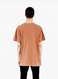 Back view of Pigment Dyed Basic Tee in Washed Rust on model