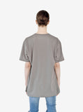 Back view of Absent Tee in Faded Khaki Gravel on model